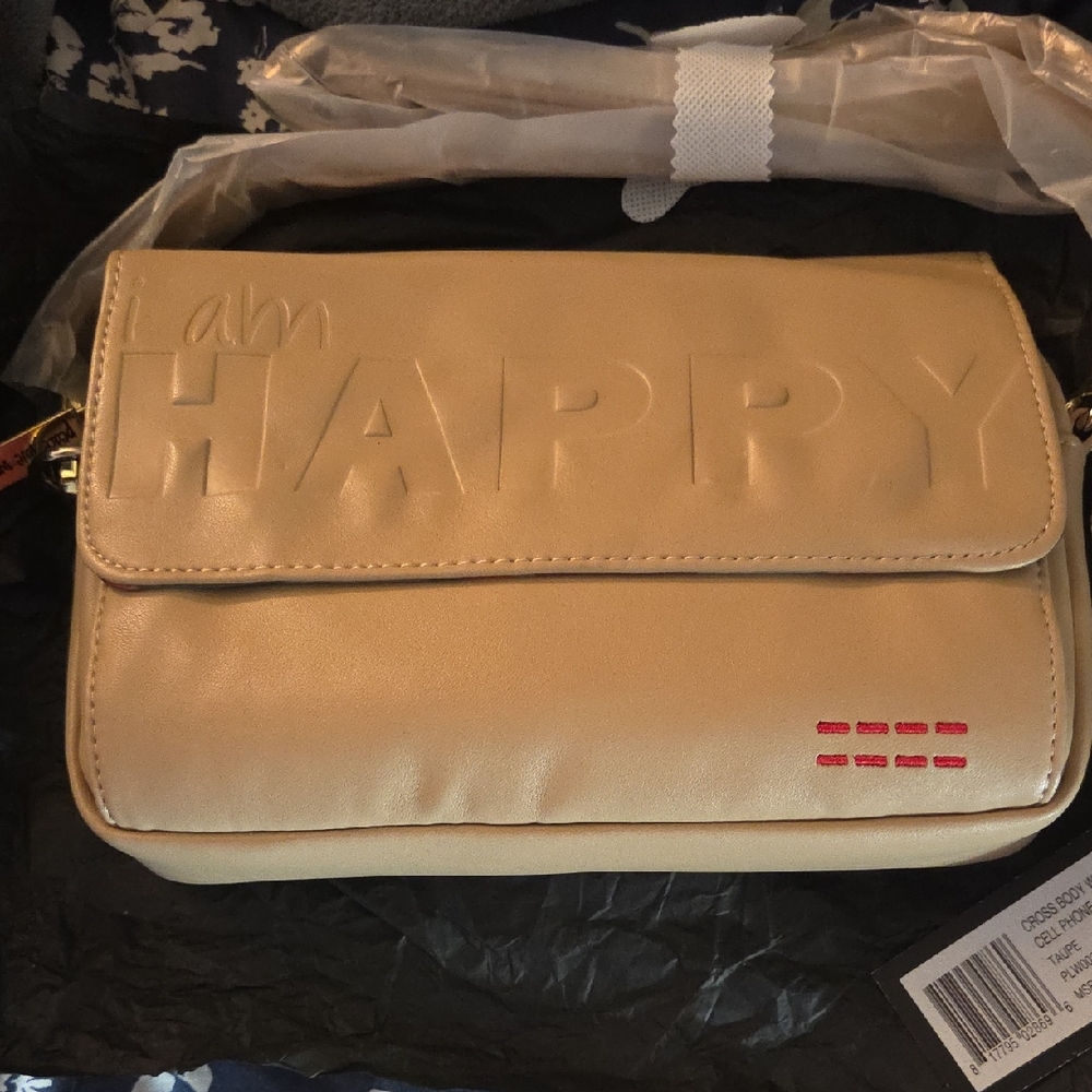 Peace Love World Tan Crossbody Bag with Embossed Design